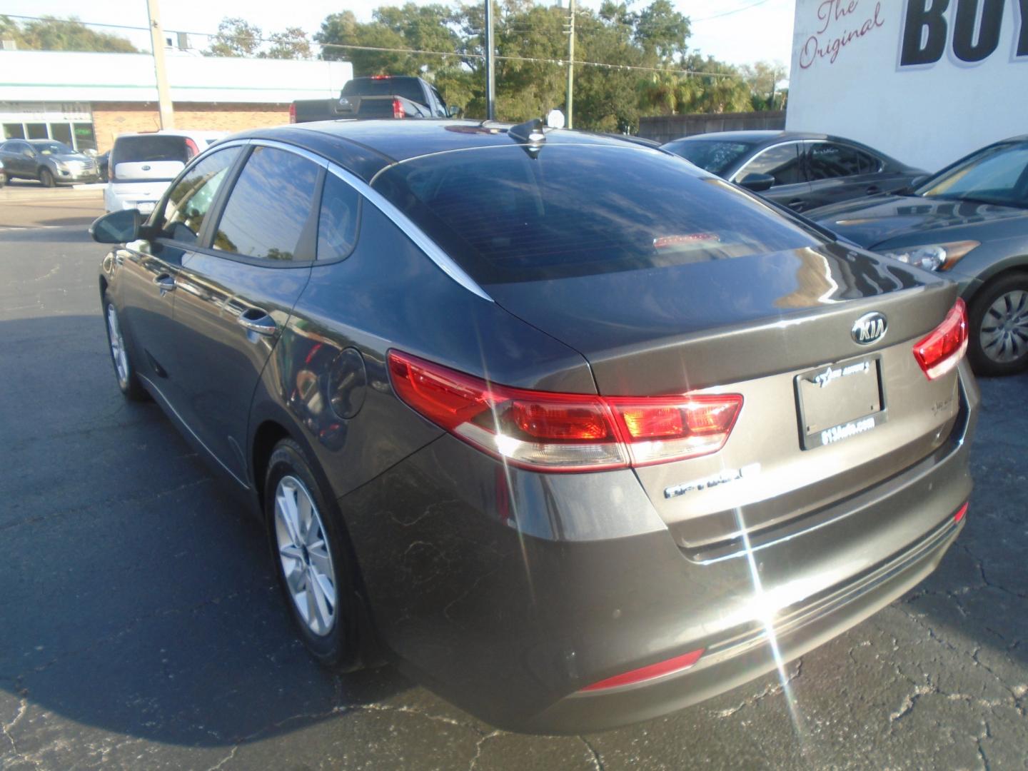 2018 Kia Optima (KNAGT4L31J5) with an 2.4L L4 DOHC 16V engine, 6-Speed Automatic transmission, located at 6112 N Florida Avenue, Tampa, FL, 33604, (888) 521-5131, 27.954929, -82.459534 - Photo#4